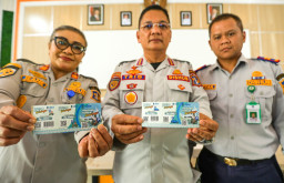 Tak Perlu Uang Tunai, Pemkot Surabaya Resmi Berlakukan Voucher Parkir