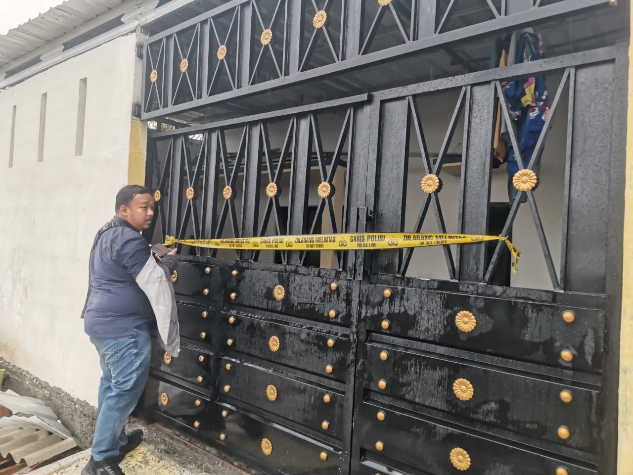 Rumah tempat pembunuhan pisau dalam mulut di Menganti, Kabupaten Gresik. (Istimewa)